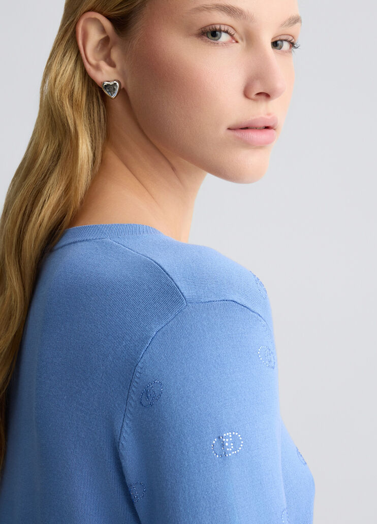 Top with logo and gemstones