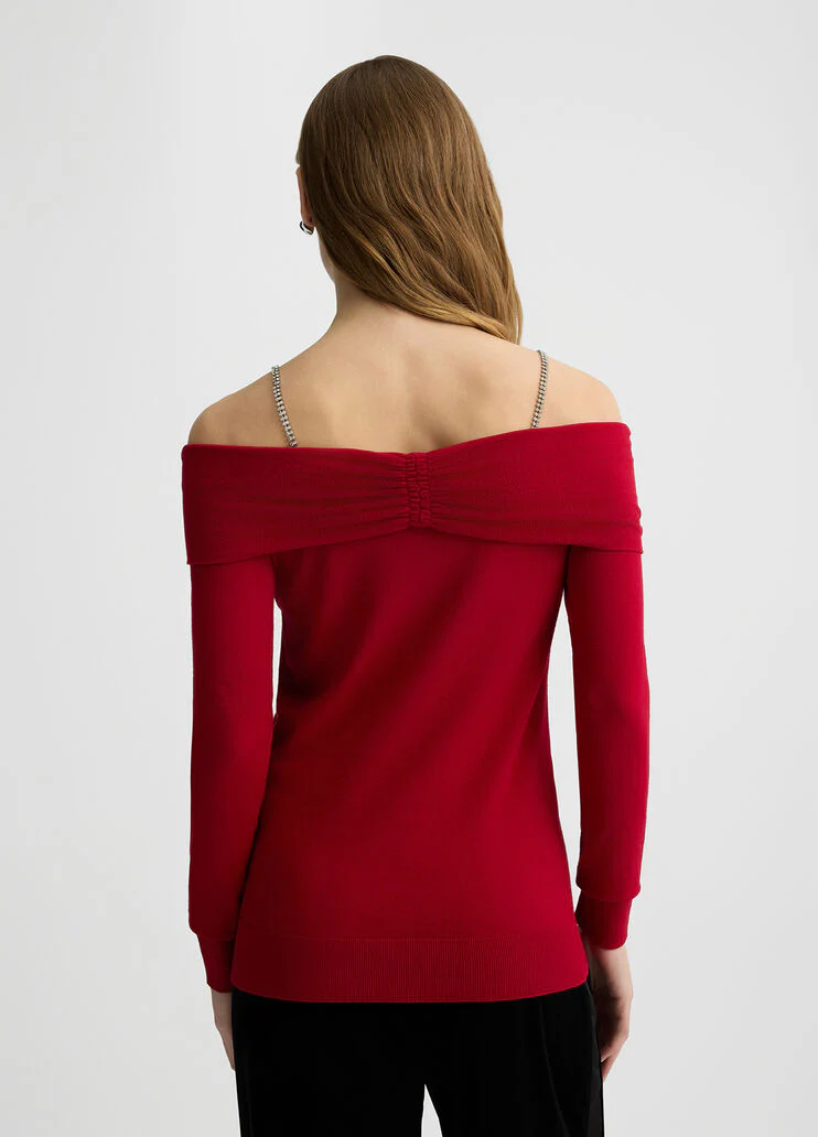 Off-the-shoulder jumper with bejewelled gemstones