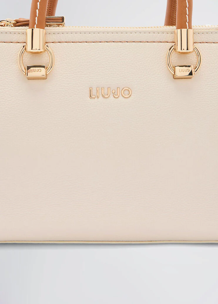 Handbag with matching clutch