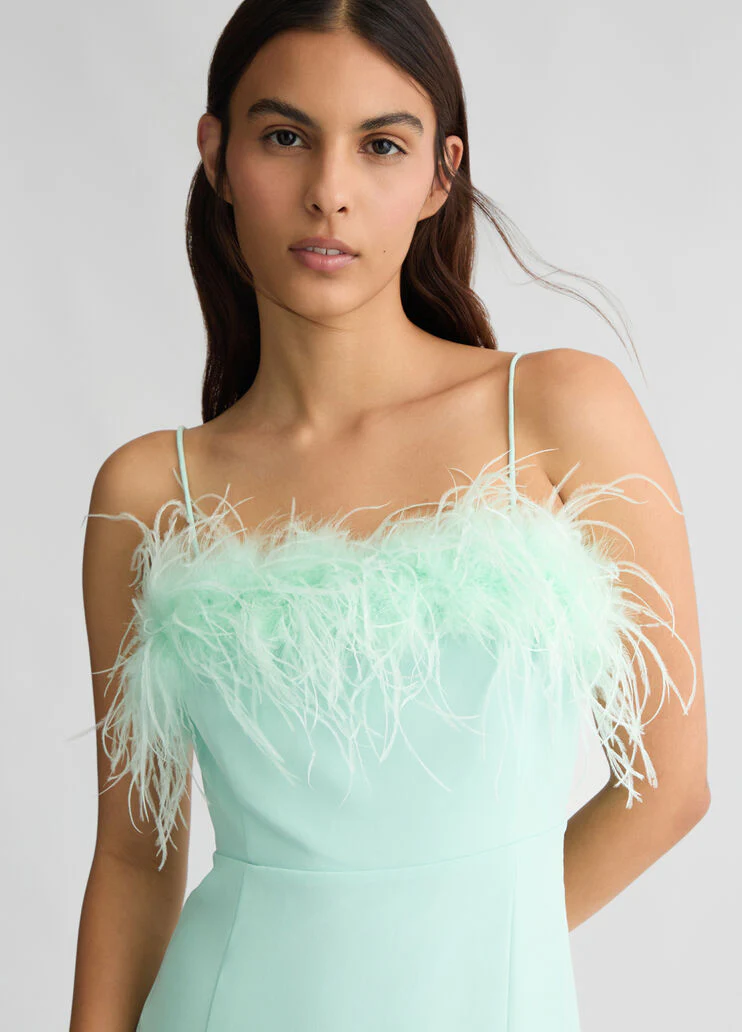 Elegant aqua green dress with feathers
