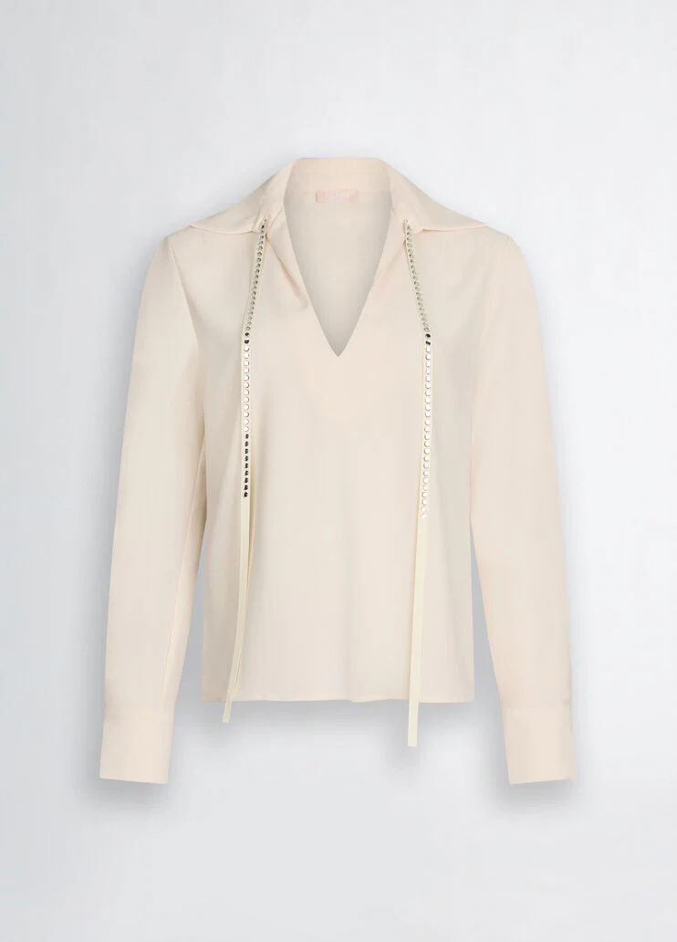 Blouse with gemstones