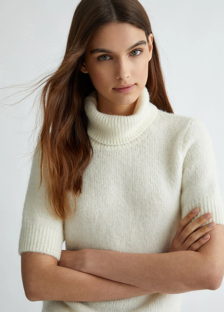 White turtleneck with cut-out