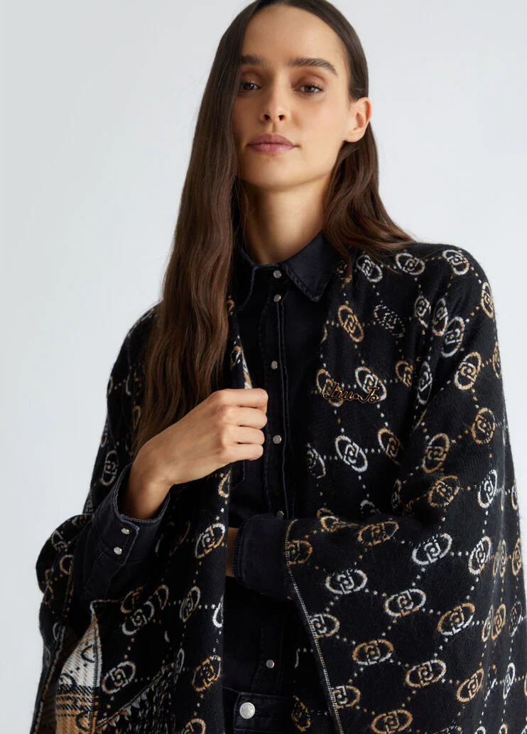 Poncho with jacquard logo