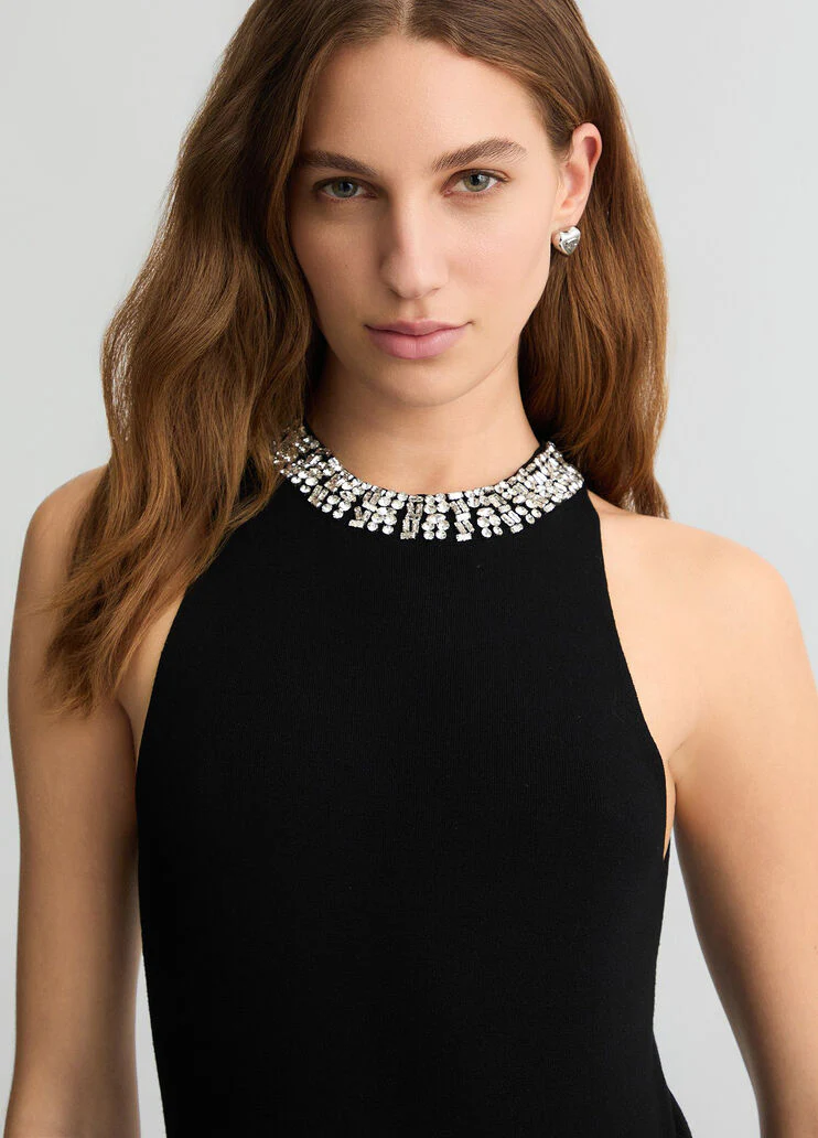 Black top with bejewelled embellishment