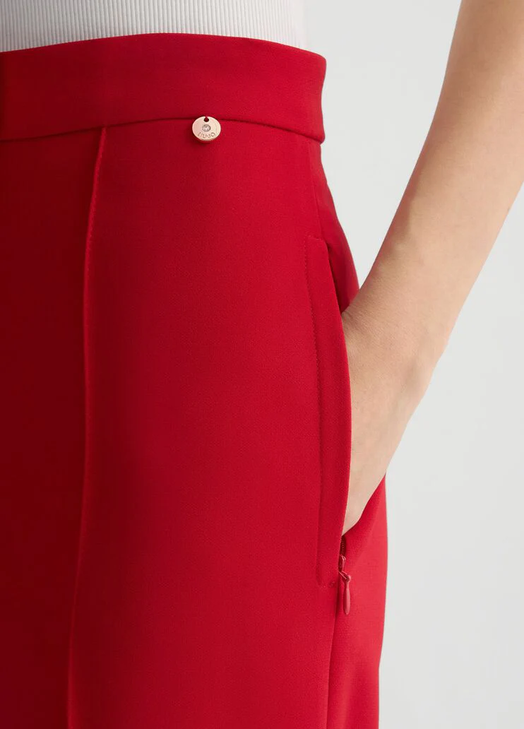 Cream cigarette trousers