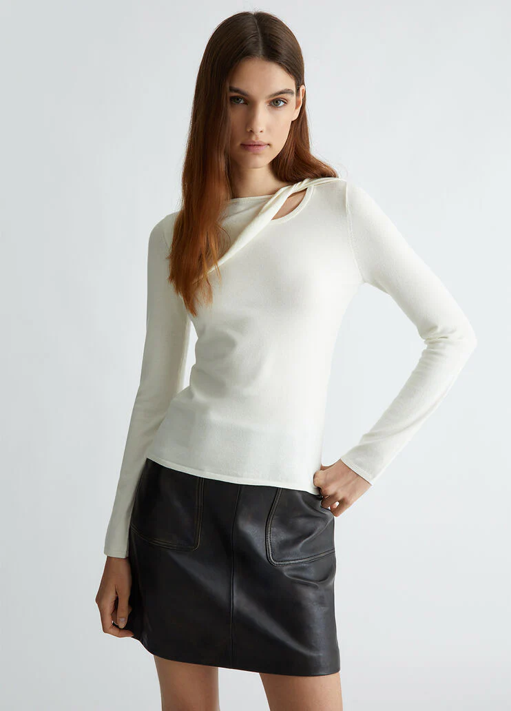 White jumper with cut-out