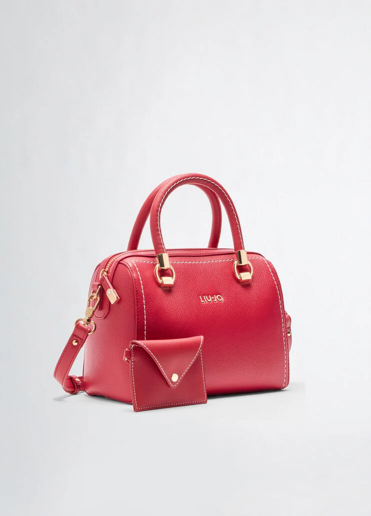 Handbag with matching clutch