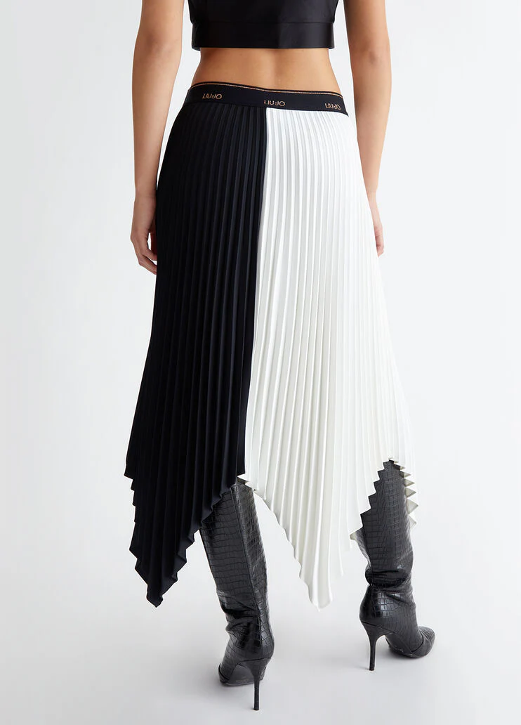 Pleated asymmetrical skirt