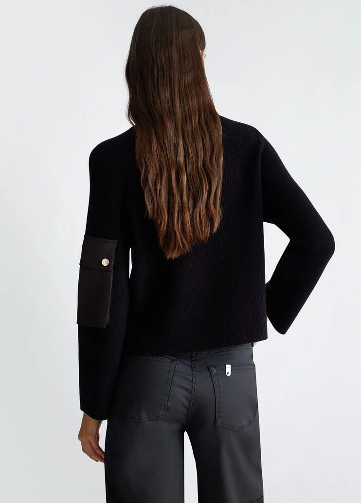 Sweater with buttons and pocket