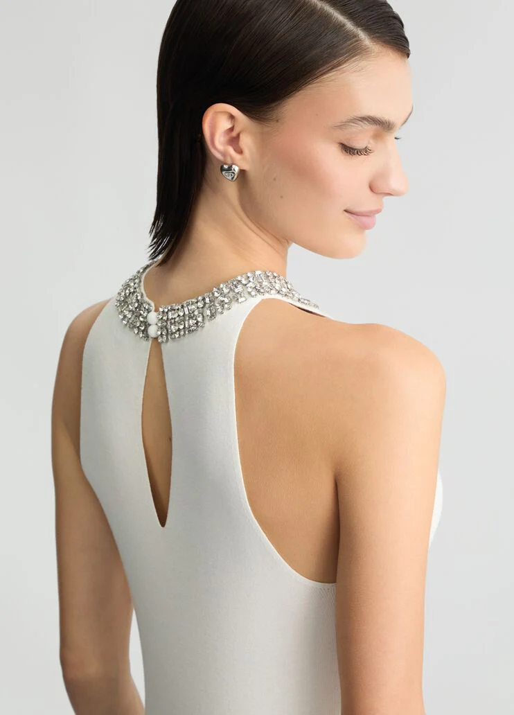White top with bejewelled embellishment