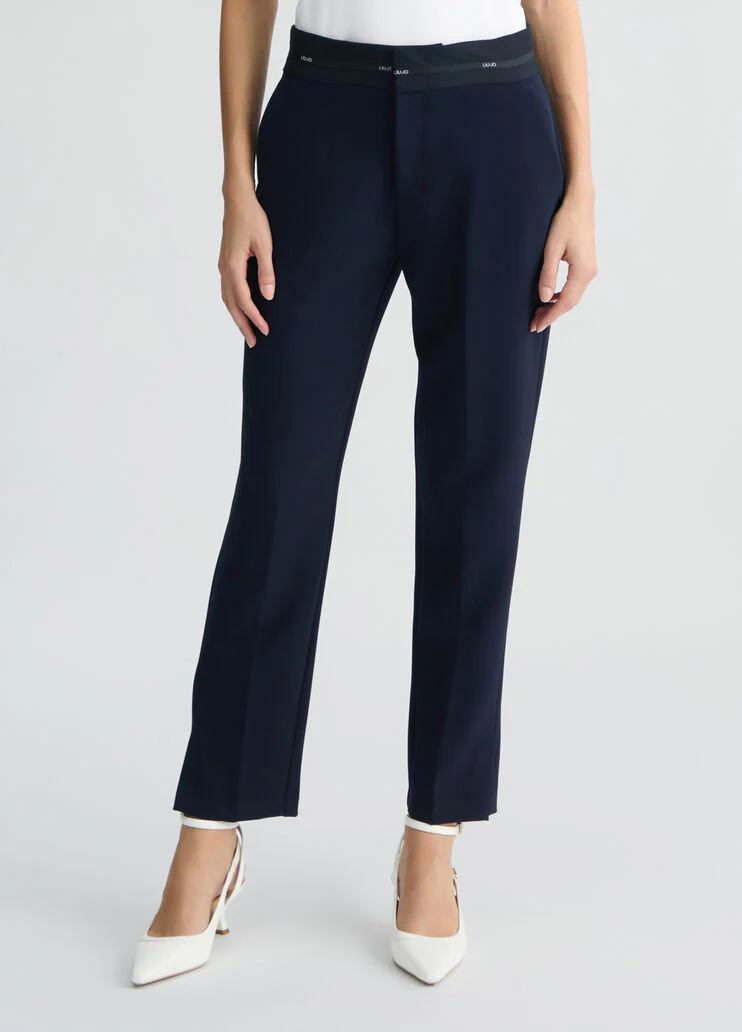 Trousers with branded waistband