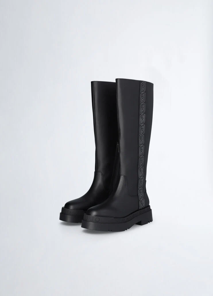 Black platform boots with logo