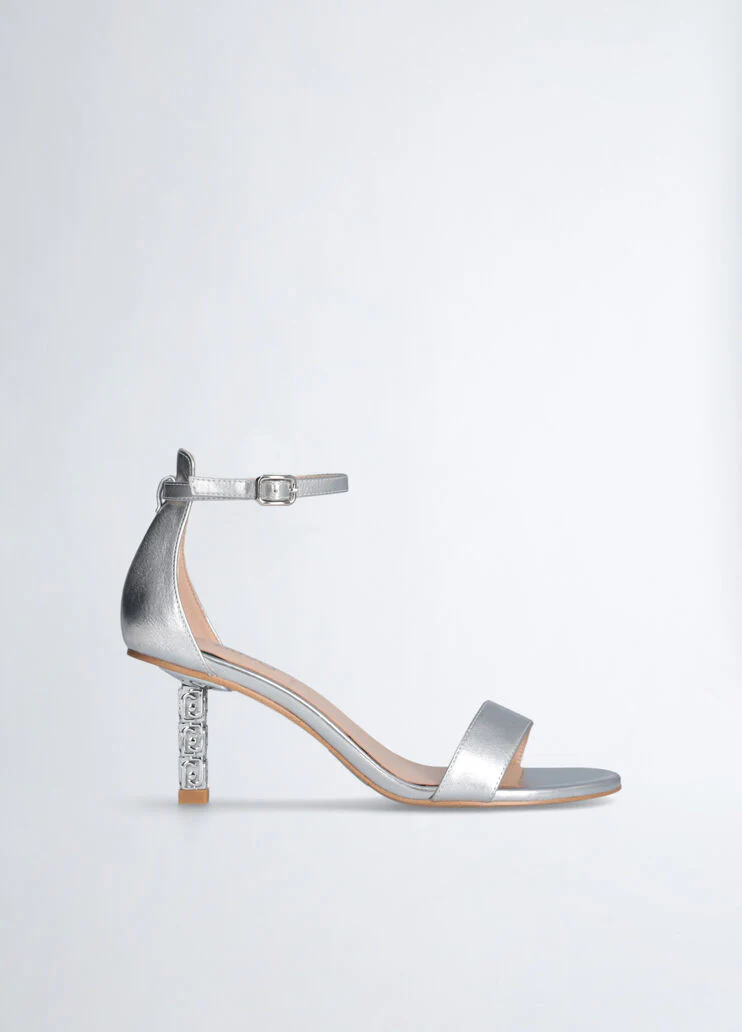 Sandals with branded heel