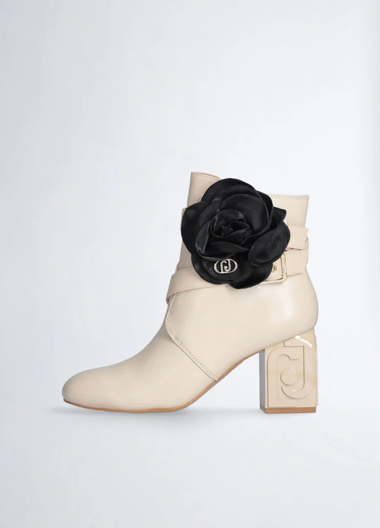 Leather ankle boot with flower detail