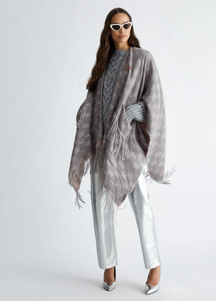 Poncho with jacquard logo