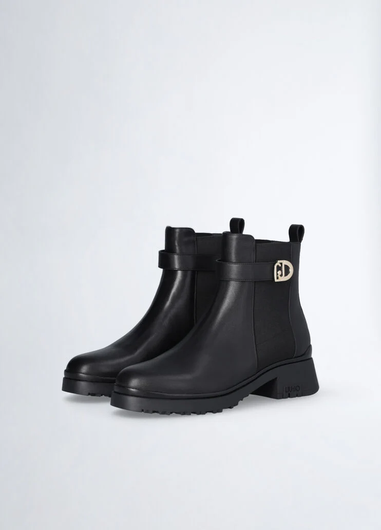 Black leather ankle boots with logo