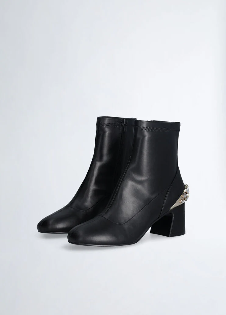 Black ankle boots with bejewelled gemstones