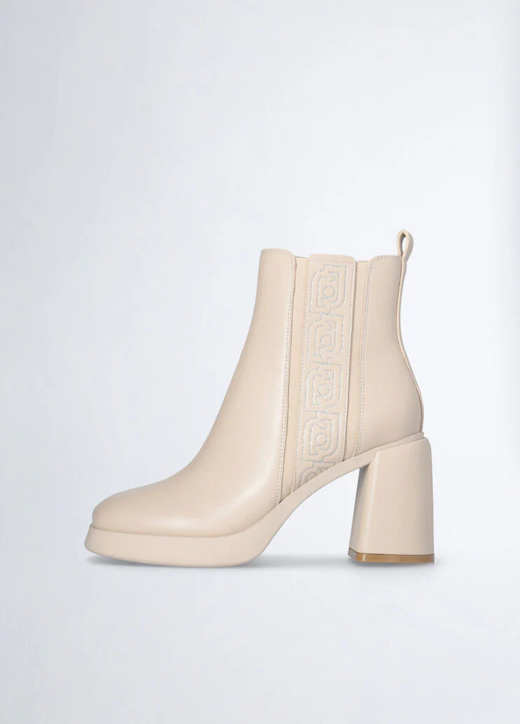 Beige ankle boots with logo