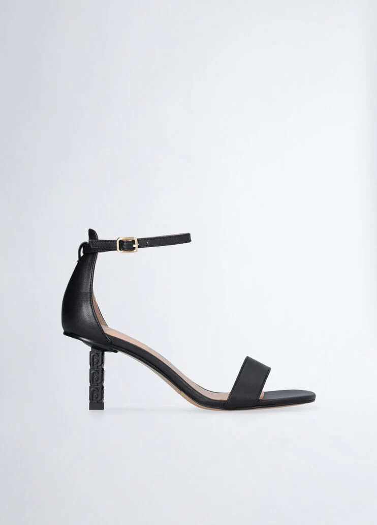 Sandals with branded heel