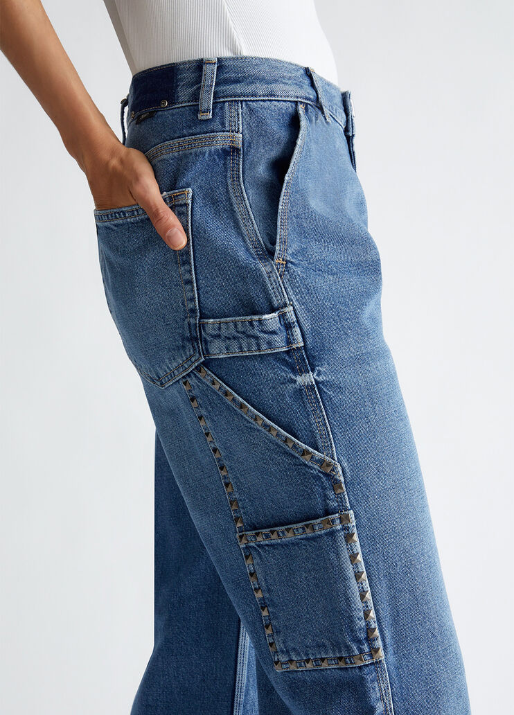 Flared jeans with studs