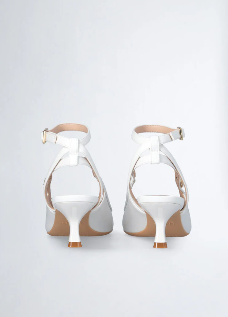White slingbacks with low heel