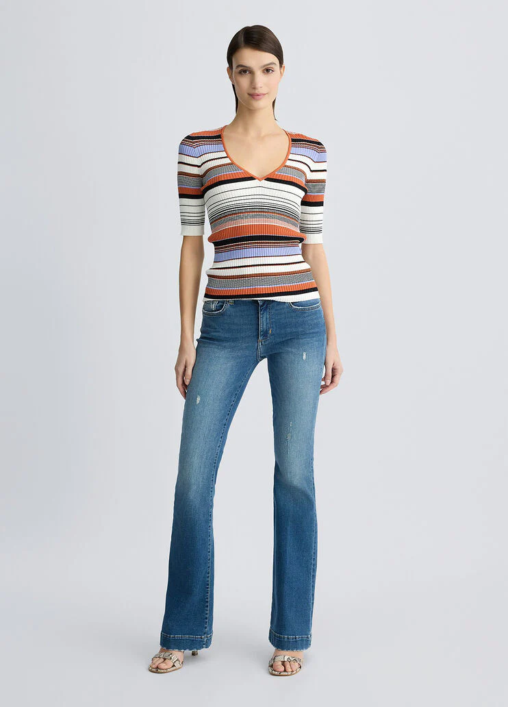 Blue bell-bottom jeans with rhinestones