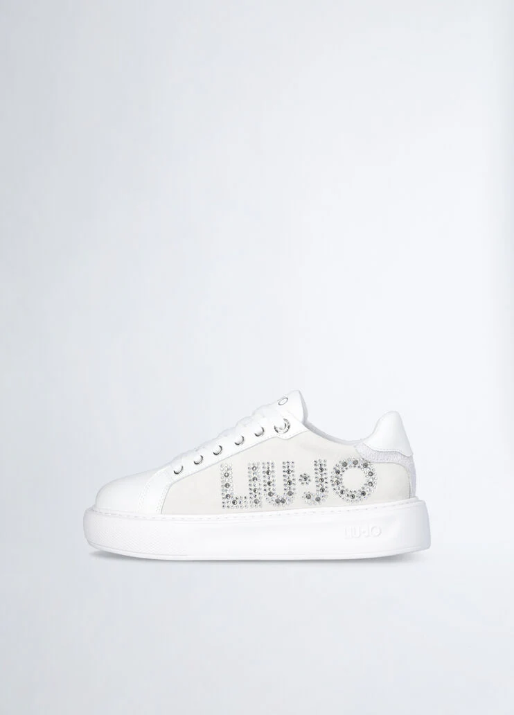 White sneakers with bejewelled logo