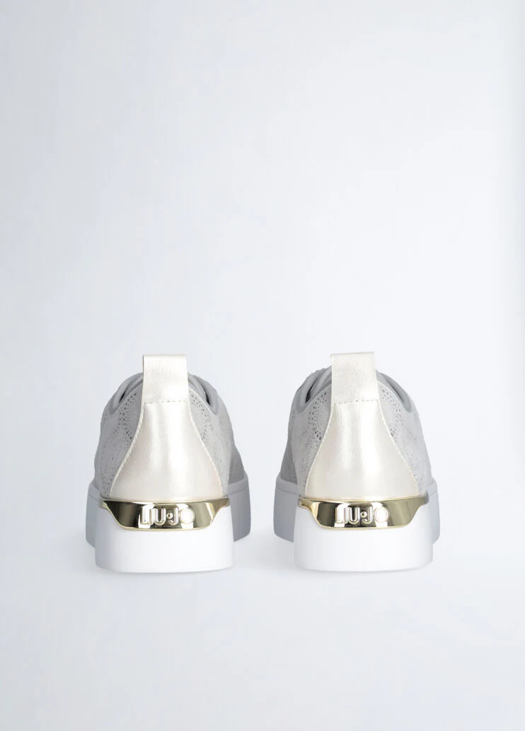 Sneakers with perforated weave