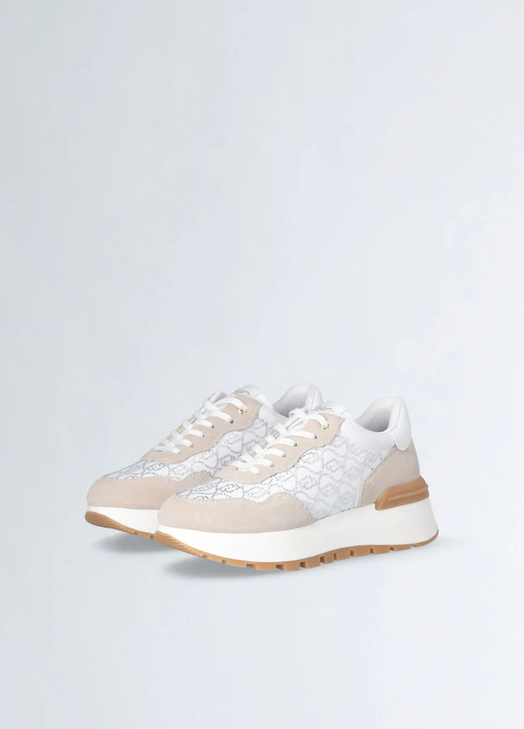 White sneakers with rhinestone-detailed logo