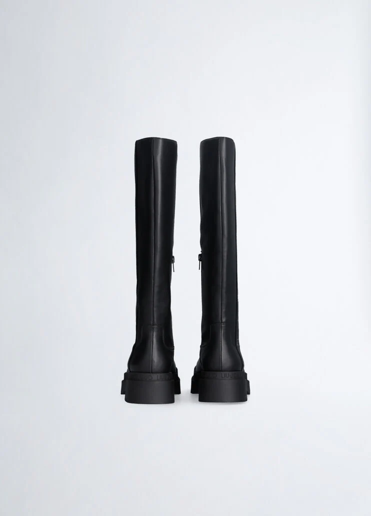 Black platform boots with logo