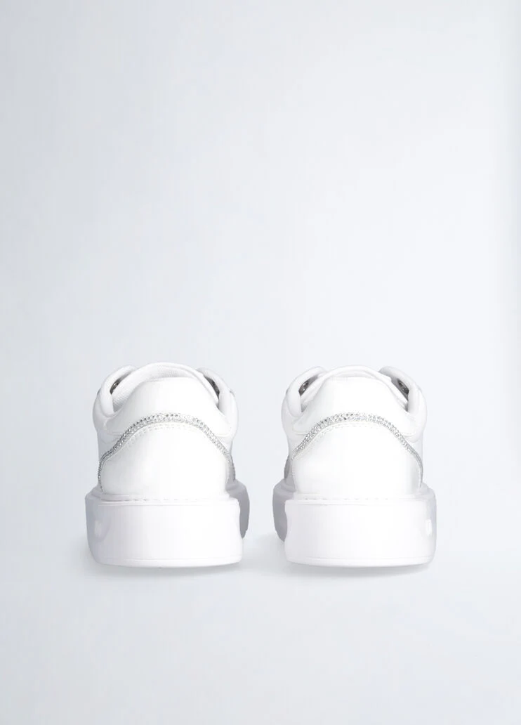White sneakers with rhinestone trims
