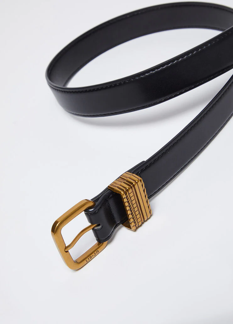 Belt with metal buckle