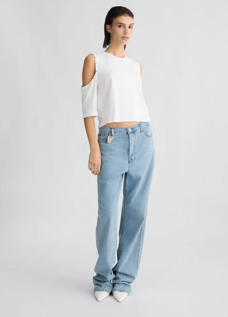 Light blue straight-leg jeans with bejewelled charm