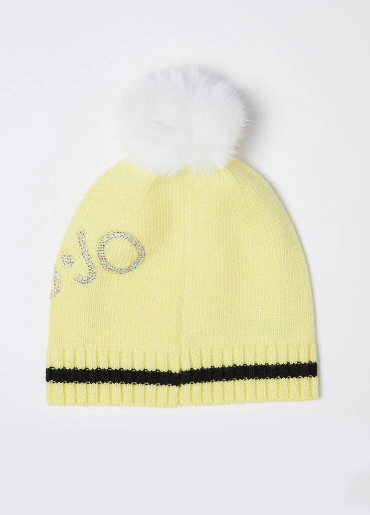 Yellow hat with pom-pom