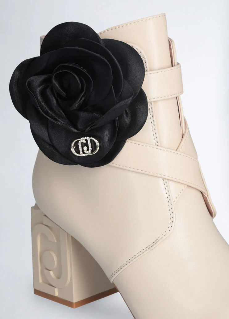 Leather ankle boot with flower detail