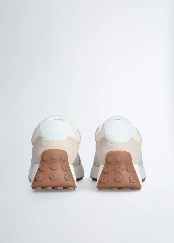 Beige sneakers with light blue logo