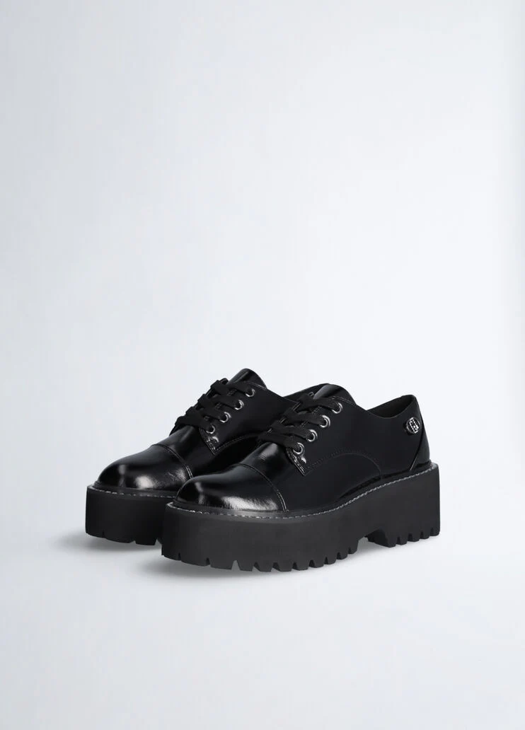 Black patent leather platform shoes