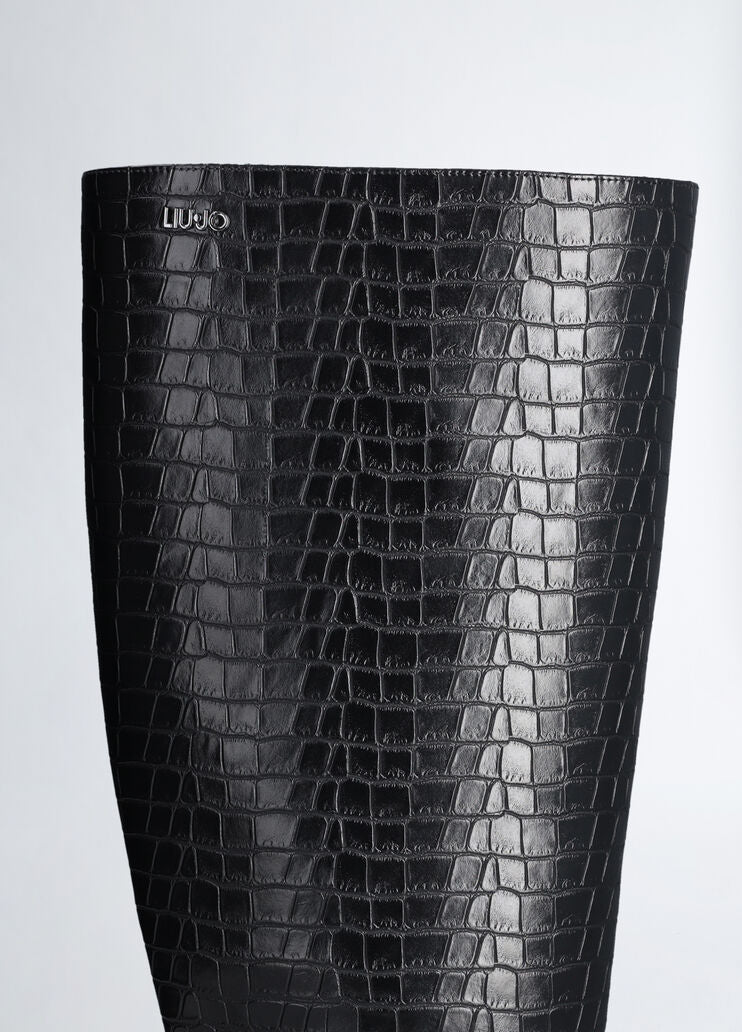 Crocodile-print knee-high boots