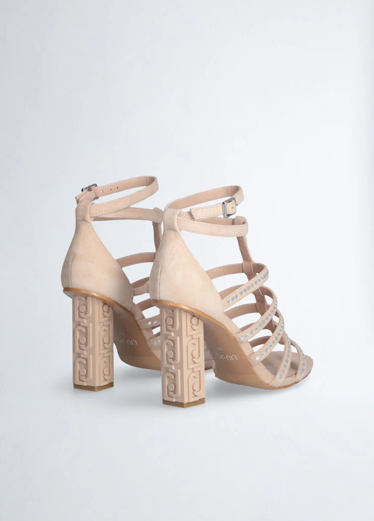 Sandals with branded heel