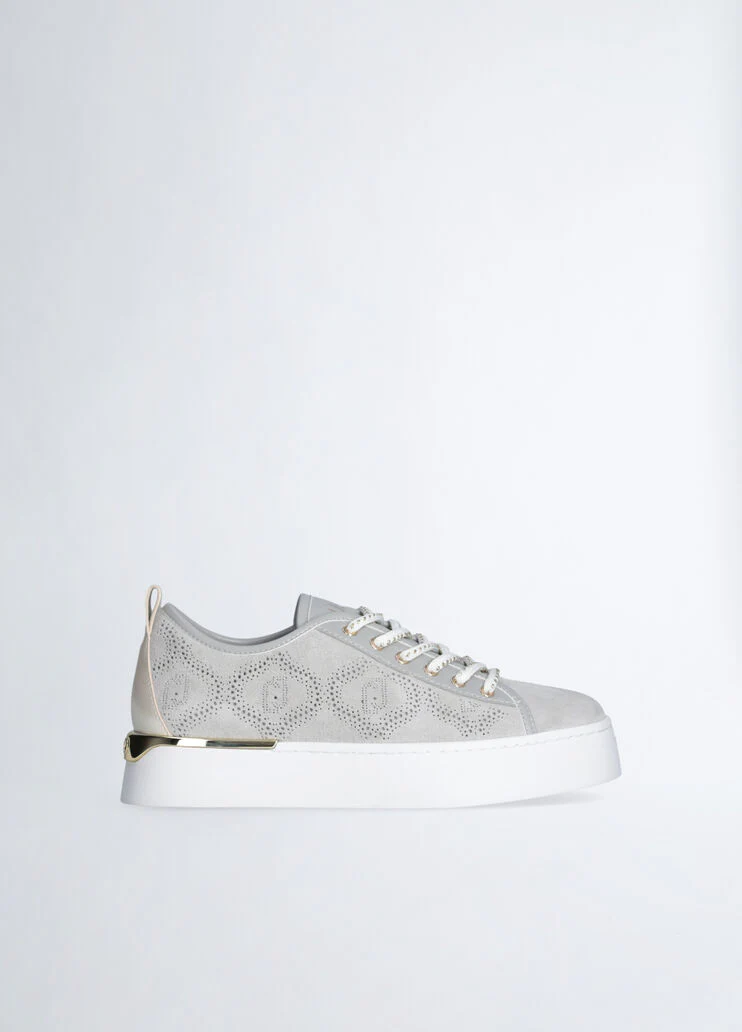 Sneakers with perforated weave