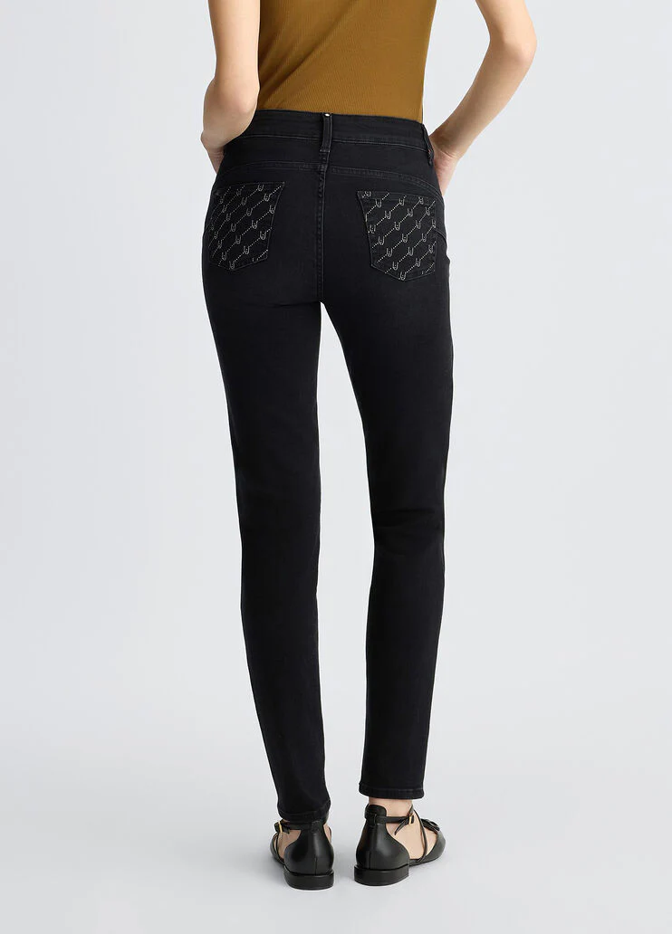 Black skinny jeans with rhinestones