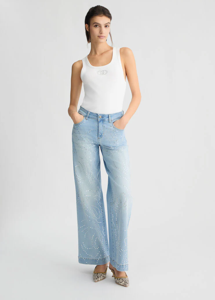 Flared jeans with studs