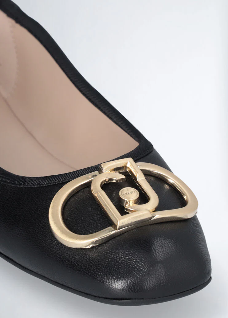 Black leather ballet flats