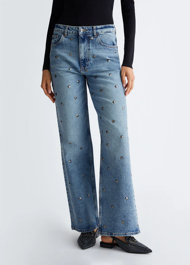 Flared jeans with studs