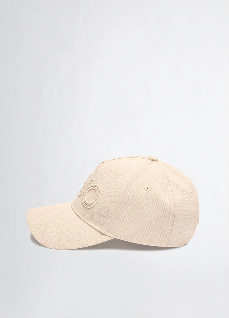 Champagne-coloured baseball cap