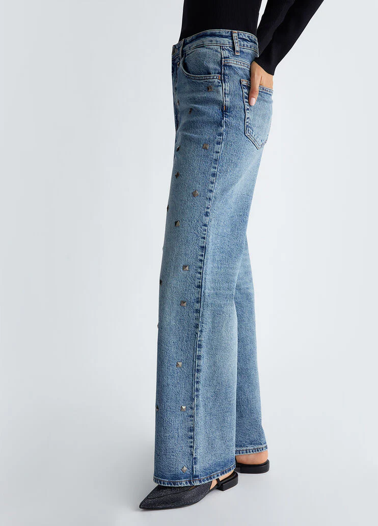 Flared jeans with studs