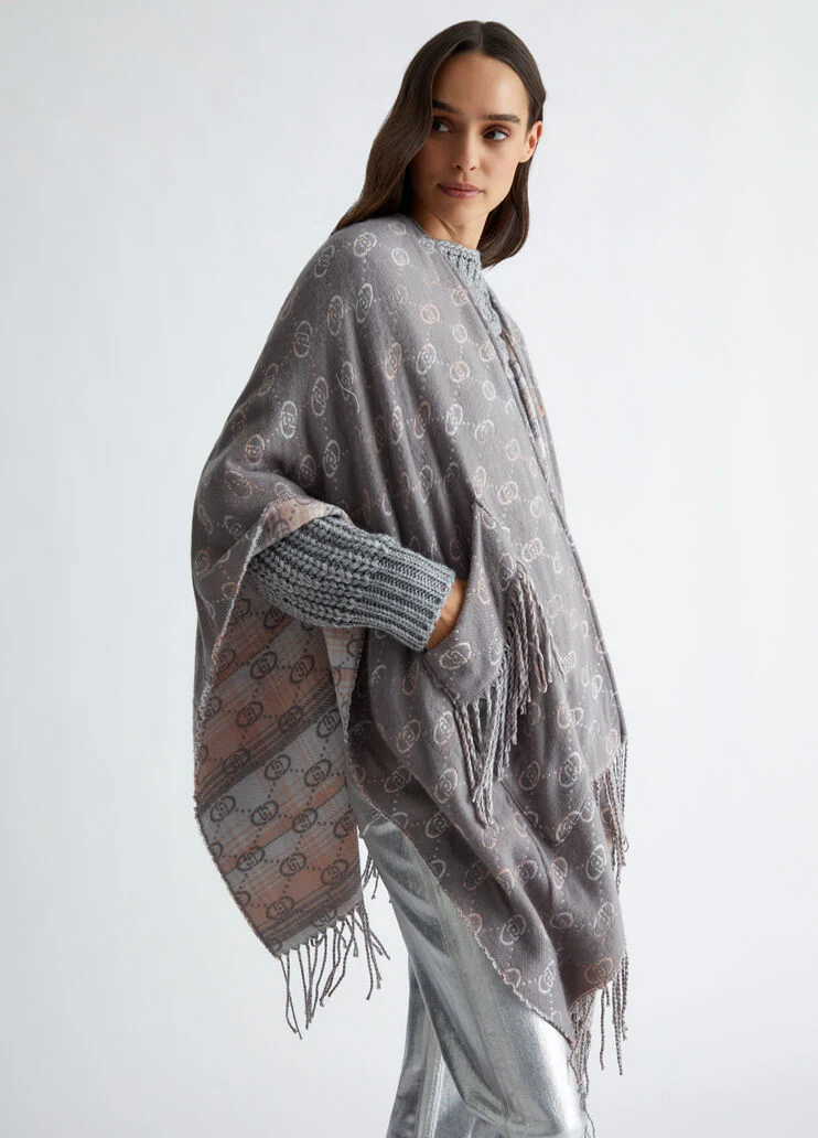 Poncho with jacquard logo
