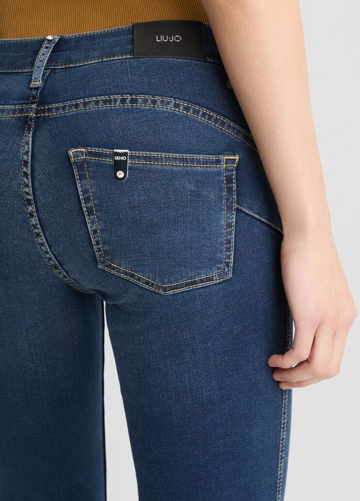 Dark blue skinny jeans with slit