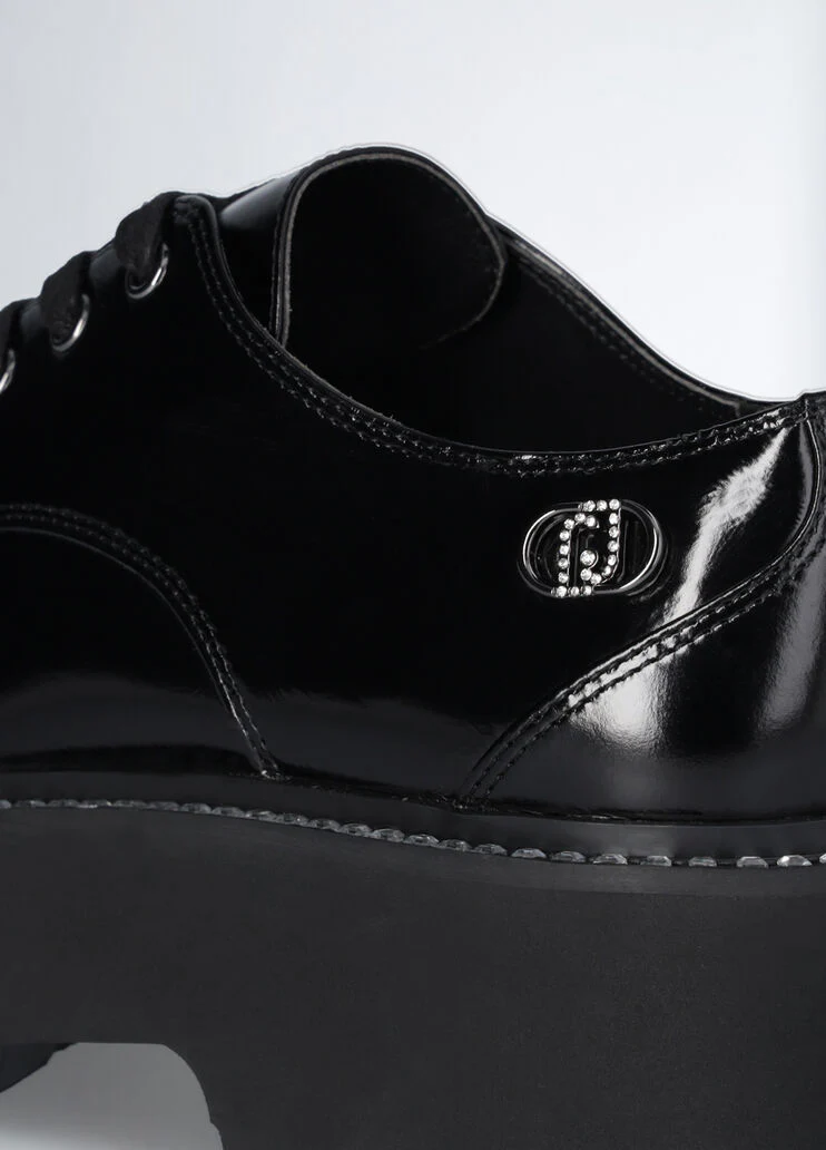 Black patent leather platform shoes