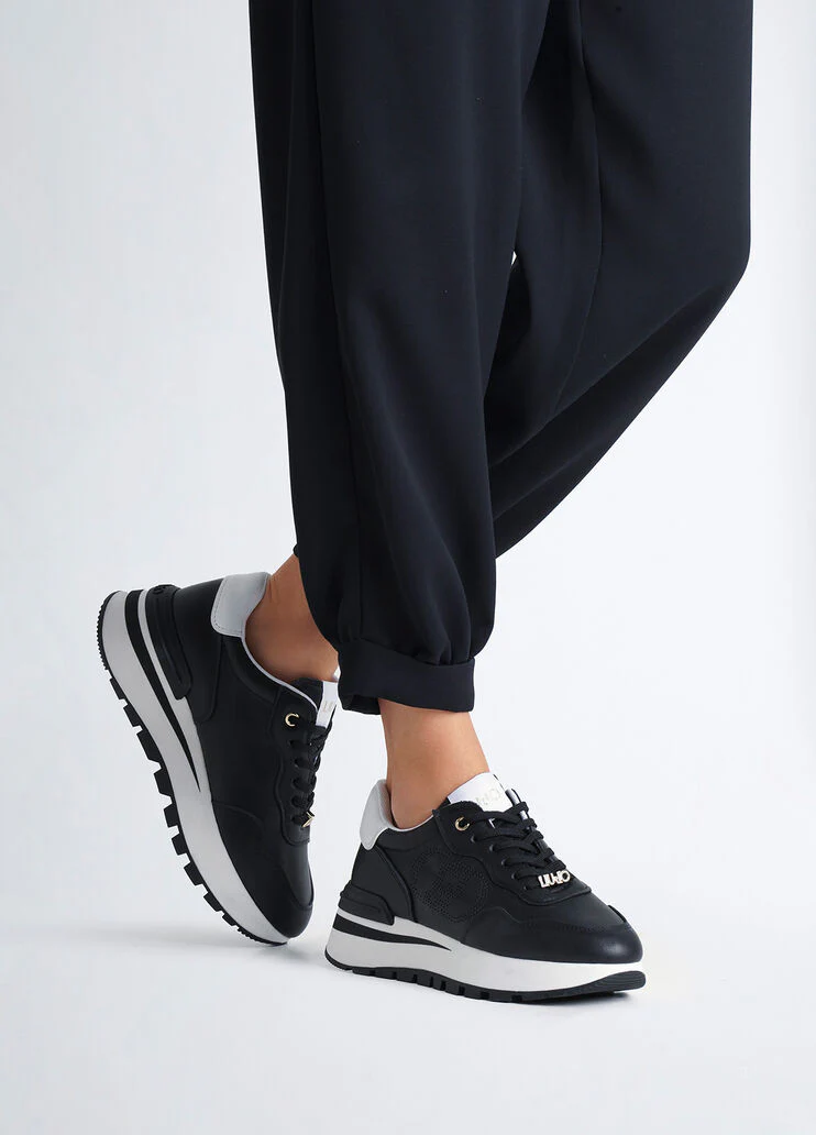 Leather sneakers with openwork logo